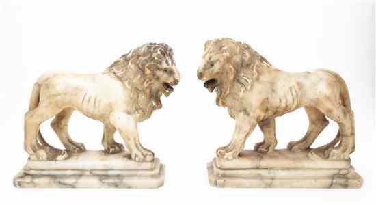 Appraisal: A Pair of Marble Figures each depicting a lion set