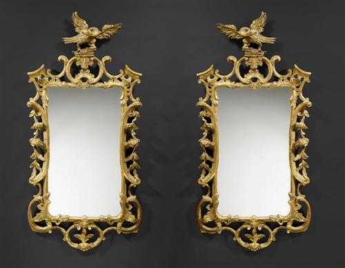 Appraisal: PAIR OF CARVED GILTWOOD MIRRORS George III England circa With