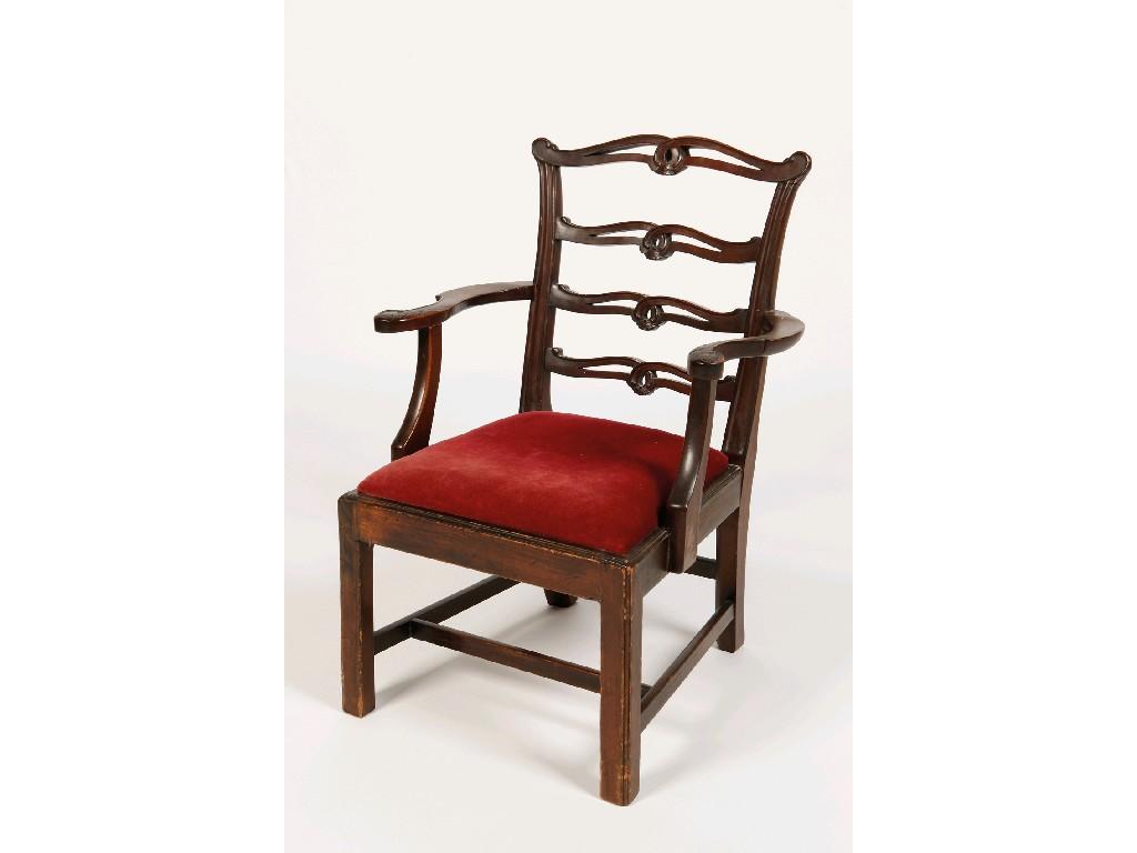 Appraisal: A CHIPPENDALE STYLE MAHOGANY LADDERBACK CHILD'S ARMCHAIR the four pierced