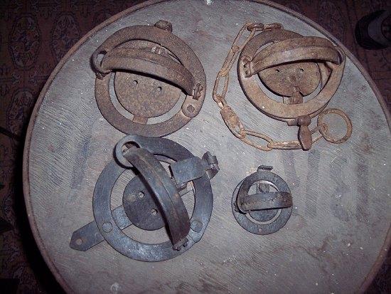 Appraisal: Four wrought iron pole traps various sizes