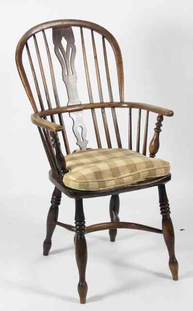 Appraisal: A th Century ash and elm high back Windsor armchair