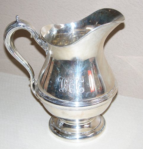 Appraisal: Artist Title Heavy Sterling footed water pitcher pint size Medium