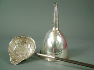 Appraisal: A Georgian silver wine funnel by 'Saml Godbehere Edward Wigan