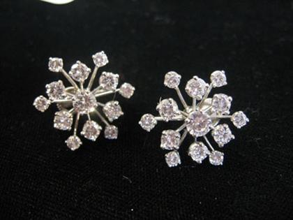 Appraisal: Pair of platinum and diamond snowflake earrings J E Caldwell