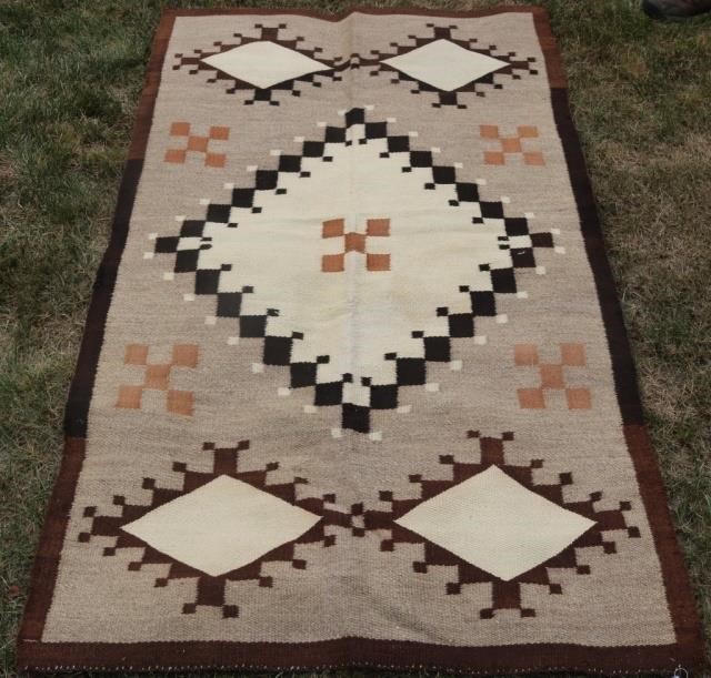 Appraisal: NAVAJO EARLY TH C TRADING POST RUG GEOMETRICDESIGN WITH TERRACED