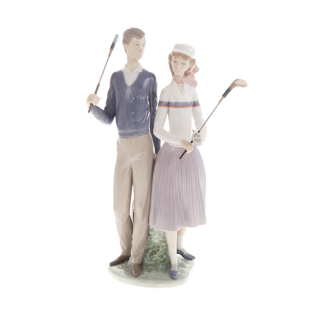 Appraisal: Lladro porcelain group Golfing Couple in H with circular wood