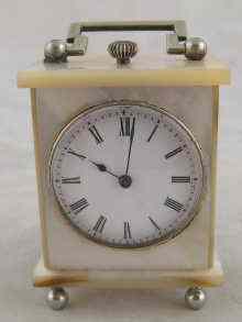 Appraisal: An unusual miniature mother of pearl clock with eight day