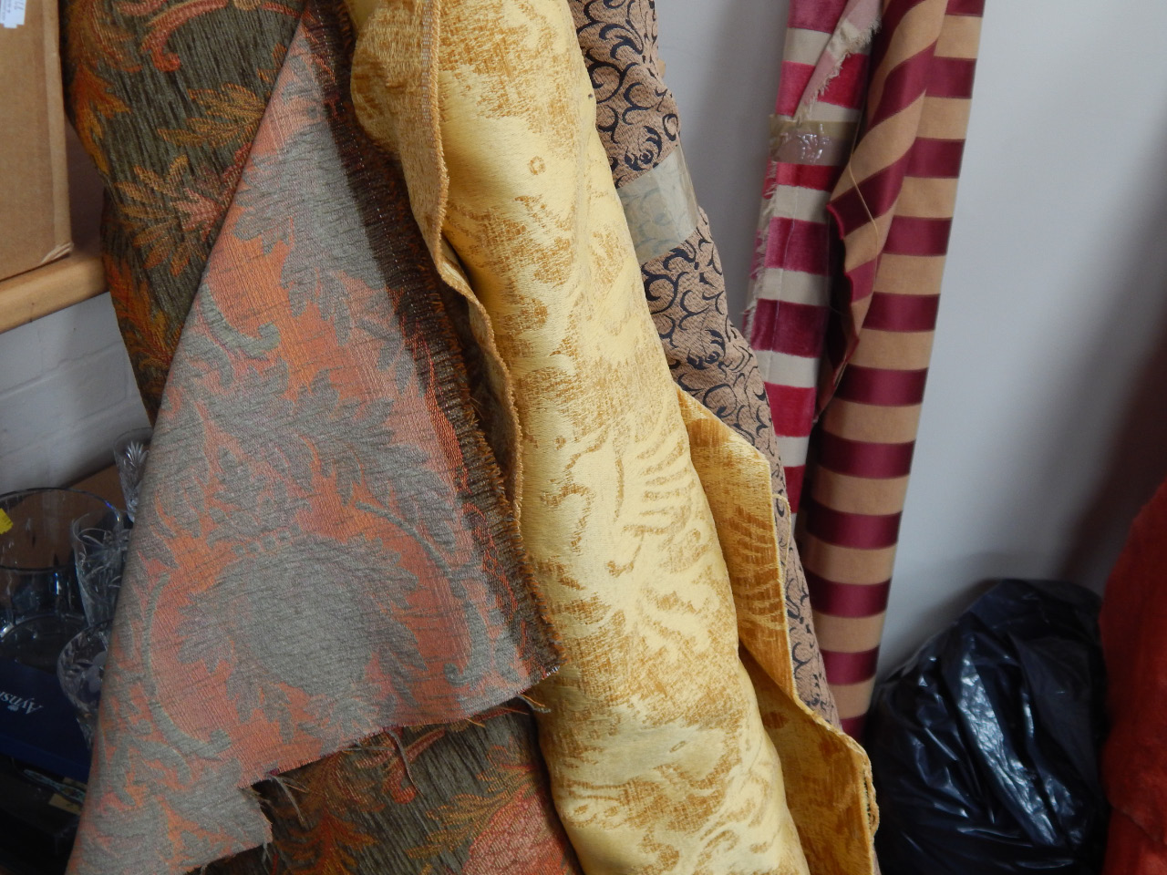 Appraisal: Four rolls of fabric comprising dralon materials and patterns