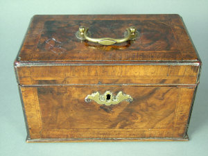 Appraisal: A George II walnut tea caddy tea caddy with feather