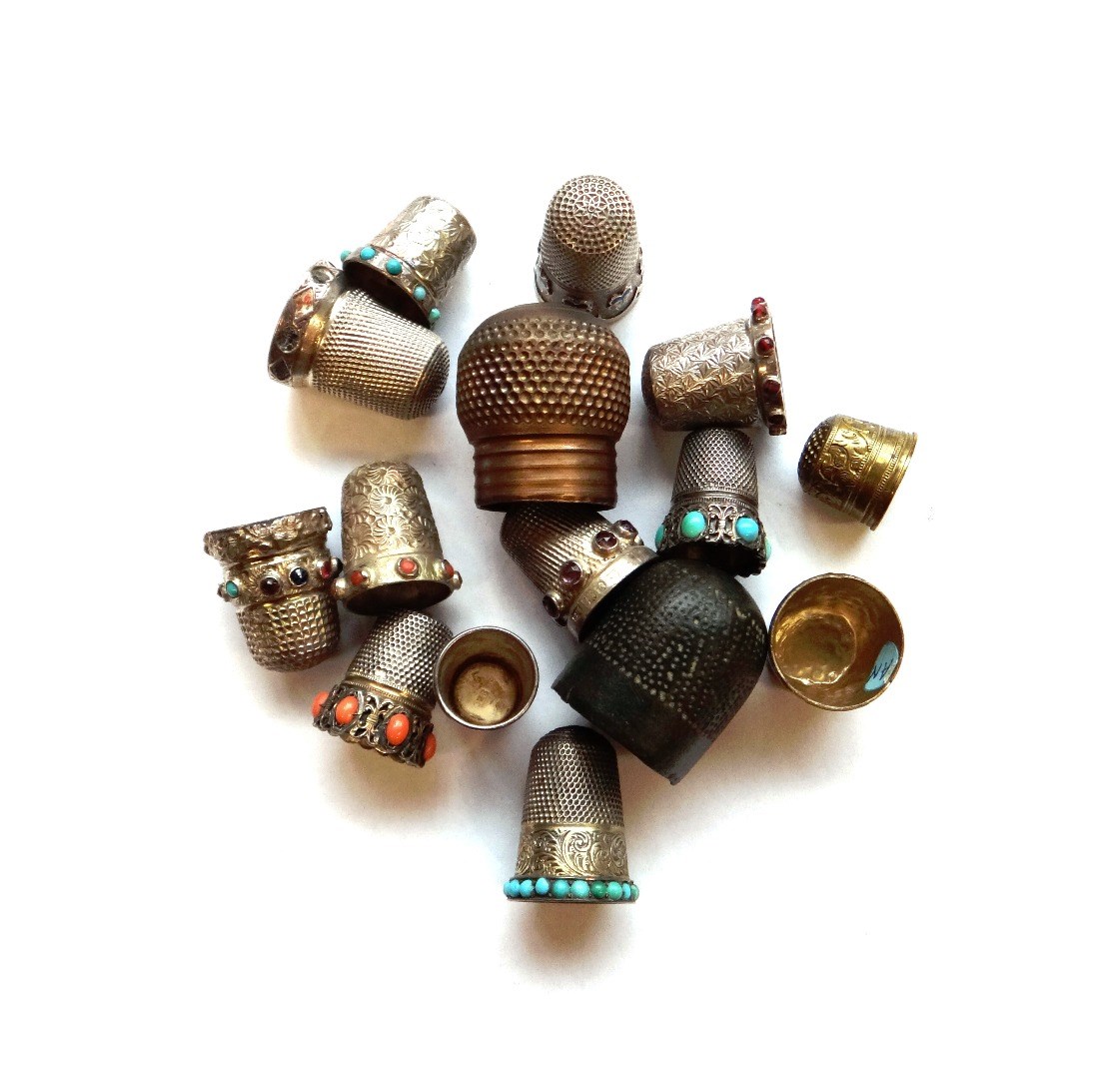 Appraisal: Seven hardstone mounted thimbles including coral turquoise and amethyst decoration