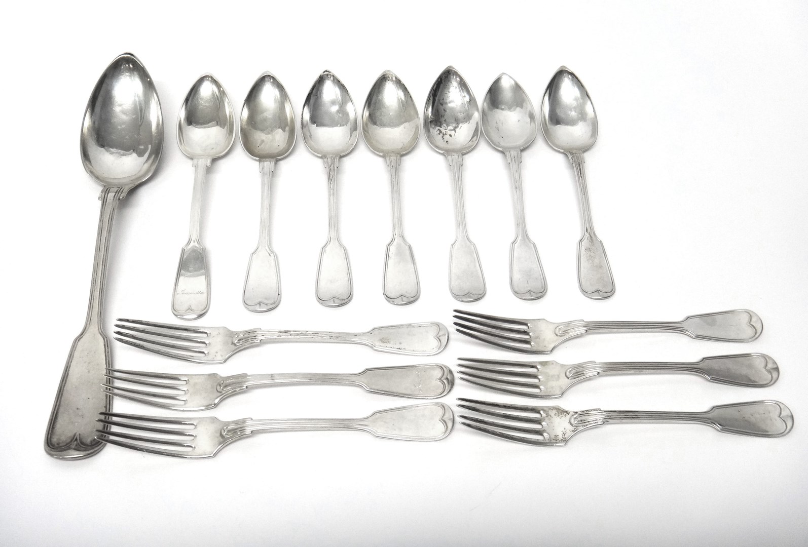 Appraisal: European stylized fiddle and thread pattern table flatware comprising a