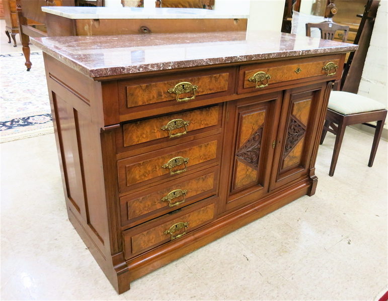 Appraisal: A VICTORIAN WALNUT AND BURL WALNUT BUFFET American th century