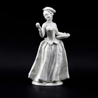 Appraisal: Vintage Hutschenreuther Figurine Woman With Fruit Signed Repair to arm