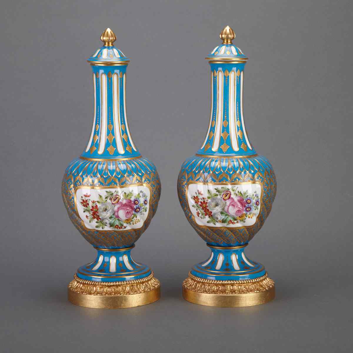 Appraisal: Pair of Ormolu Mounted S vres T Vases and Covers