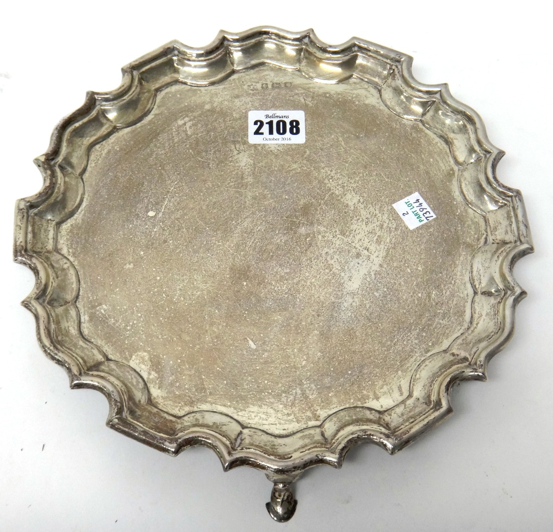 Appraisal: A silver salver of shaped circular form in the Chippendale