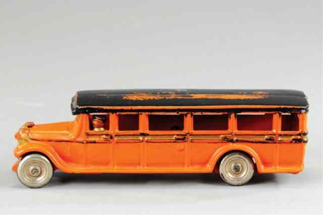 Appraisal: FREIDAG BUS Cast iron painted in orange body black roof