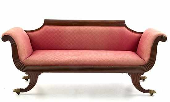 Appraisal: Classical style mahogany sofa early th century shaped crestrail over