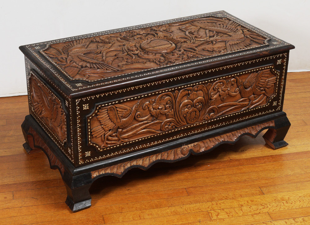 Appraisal: CARVED ORIENTAL BLANKET CHEST Hinged lid with carved central medallion