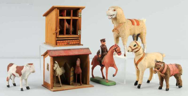 Appraisal: Lot of Wood Composition Animal Toys Description Includes one poodle