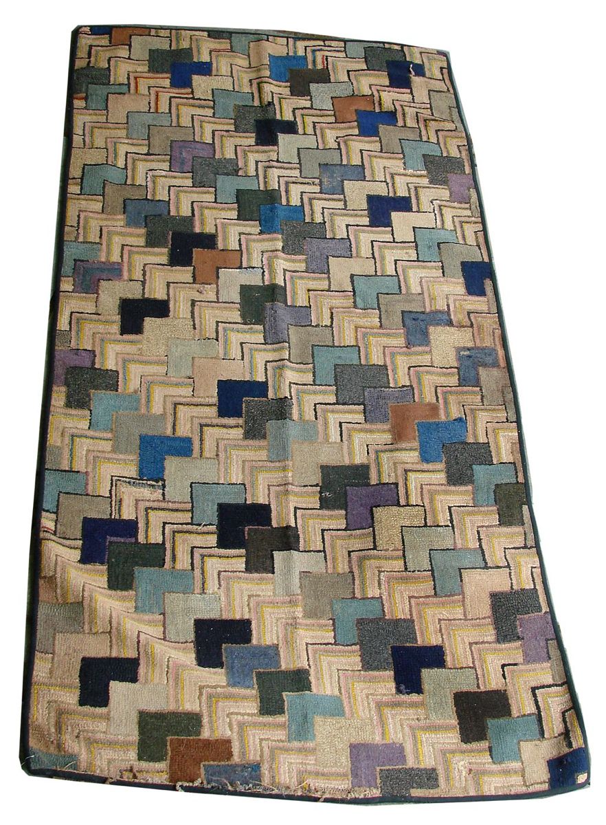 Appraisal: HOOKED RUG ' x ' Geometric pattern of diagonally repeating