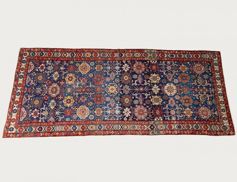 Appraisal: ANTIQUE SHIRVIN RUG The center blue field with various allover