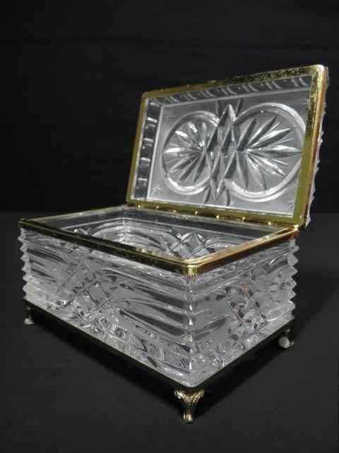 Appraisal: Frosted and cut crystal jewelry casket Gold-tone metal mounts Footed