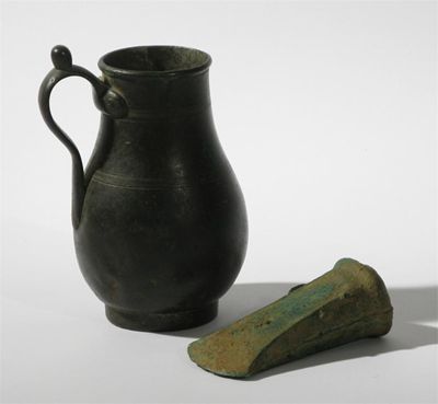 Appraisal: A copper axehead probably Neolithic and a bronze pear shaped