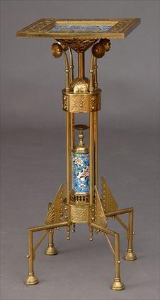 Appraisal: AESTHETIC MOVEMENT BRASS AND LONGWY FAIENCE STAND ATTRIBUTED TO BRADLEY