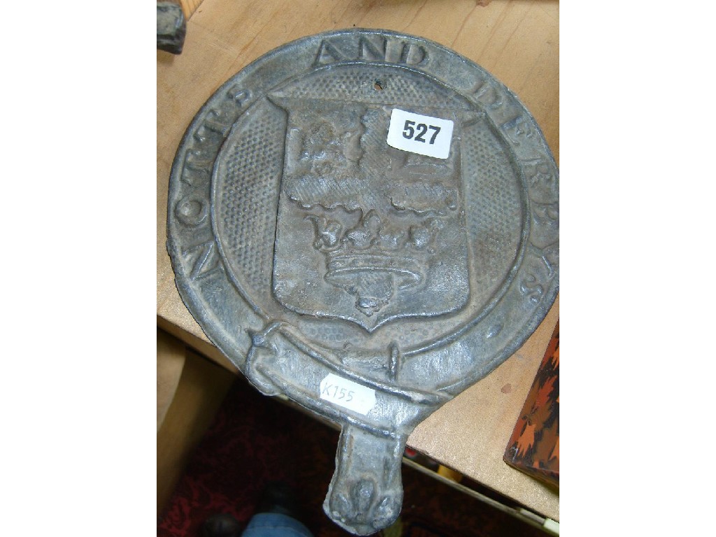 Appraisal: An th century cast lead plaque inscribed Notts and Derby