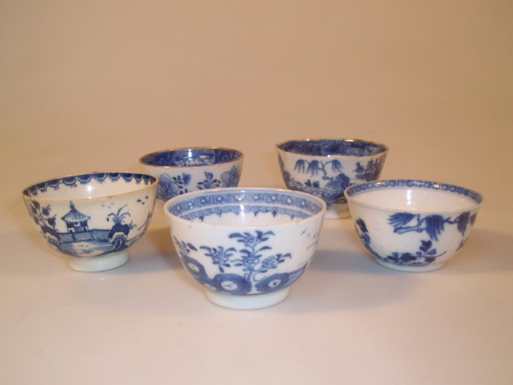 Appraisal: Five thC English blue and white tea bowls painted in