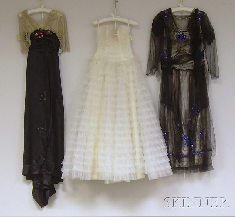 Appraisal: Three Evening Dresses a black net dress with blue accent