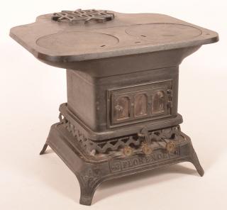 Appraisal: century cast iron miniature cook stove marked Florence with -