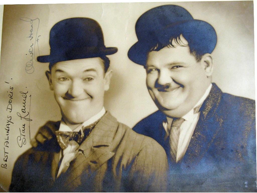 Appraisal: A photograph of Laurel and Hardy signed Best Always Doris