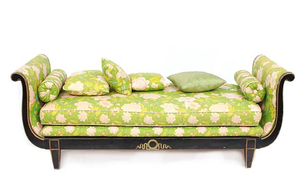 Appraisal: An Empire style ebonized and gilt heightened daybed height in