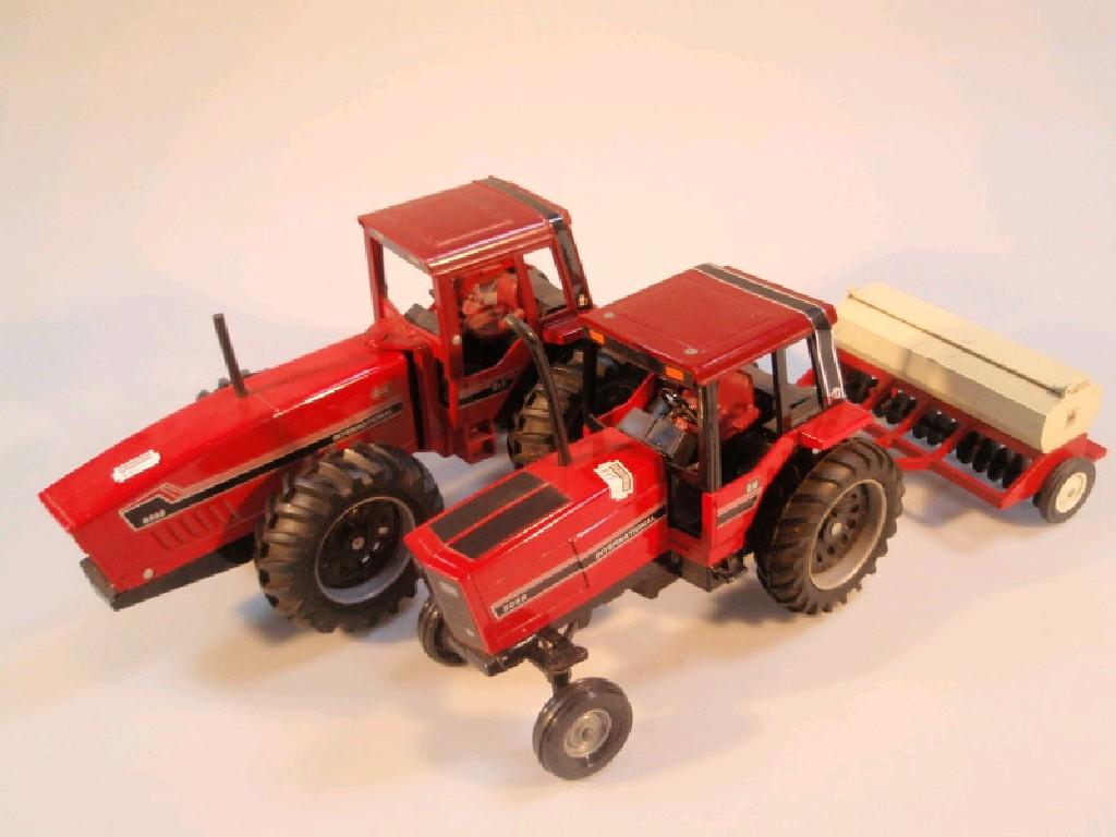 Appraisal: An Ertl die-cast model International tractor and an Ertl International