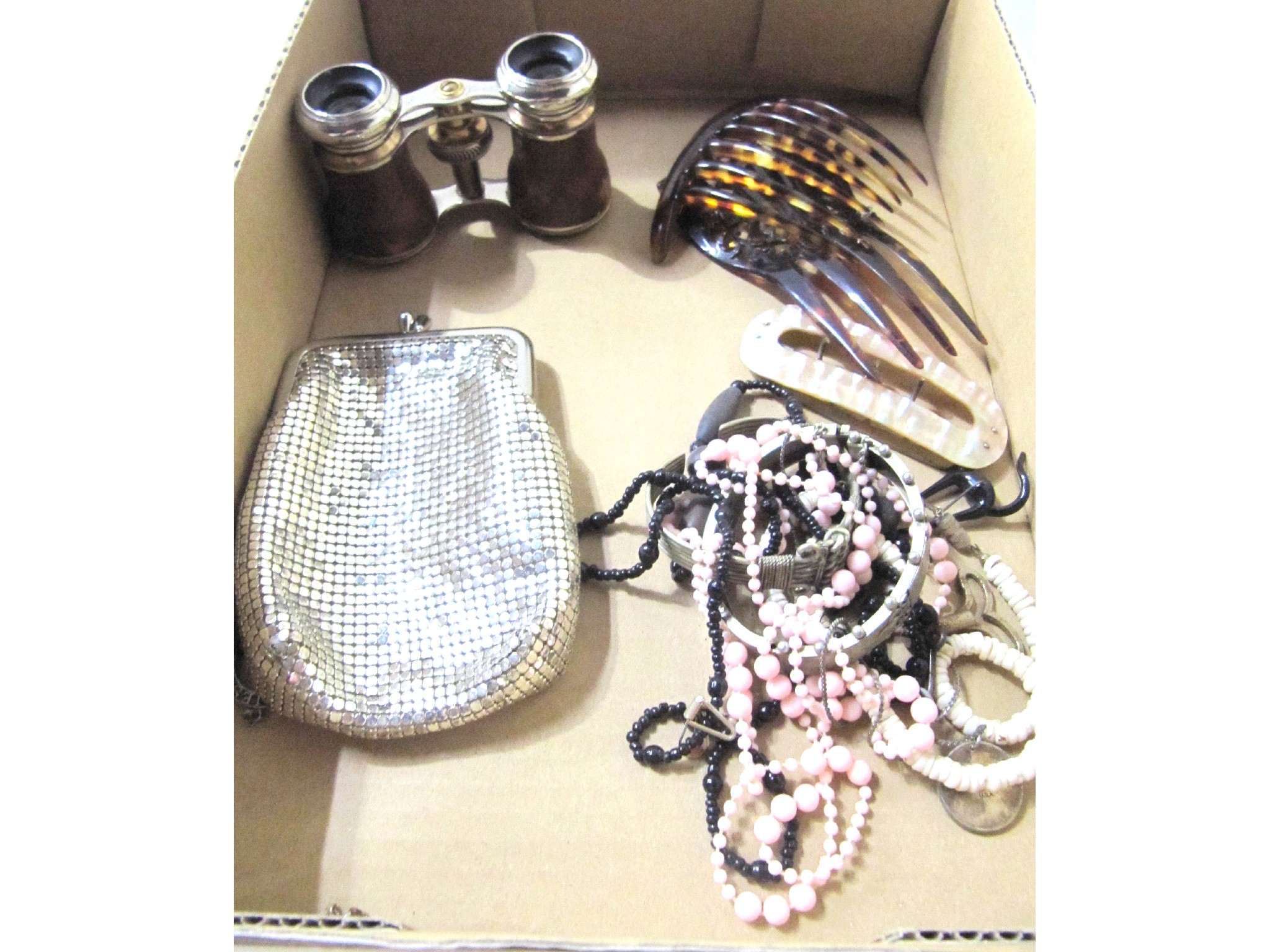 Appraisal: A lot comprising opera glasses hair combs purse costume beads