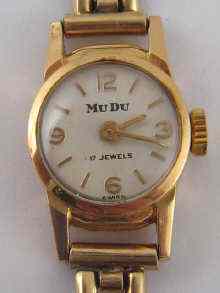 Appraisal: An carat gold lady's wrist watch on a carat gold