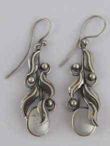 Appraisal: A pair of white metal tests silver moonstone earrings in