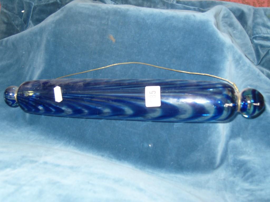 Appraisal: A th century Nailsea glass rolling pin with blue striped