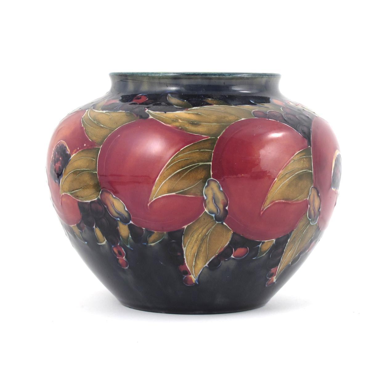 Appraisal: Pomegranate a Moorcroft Pottery vase designed by William Moorcroft