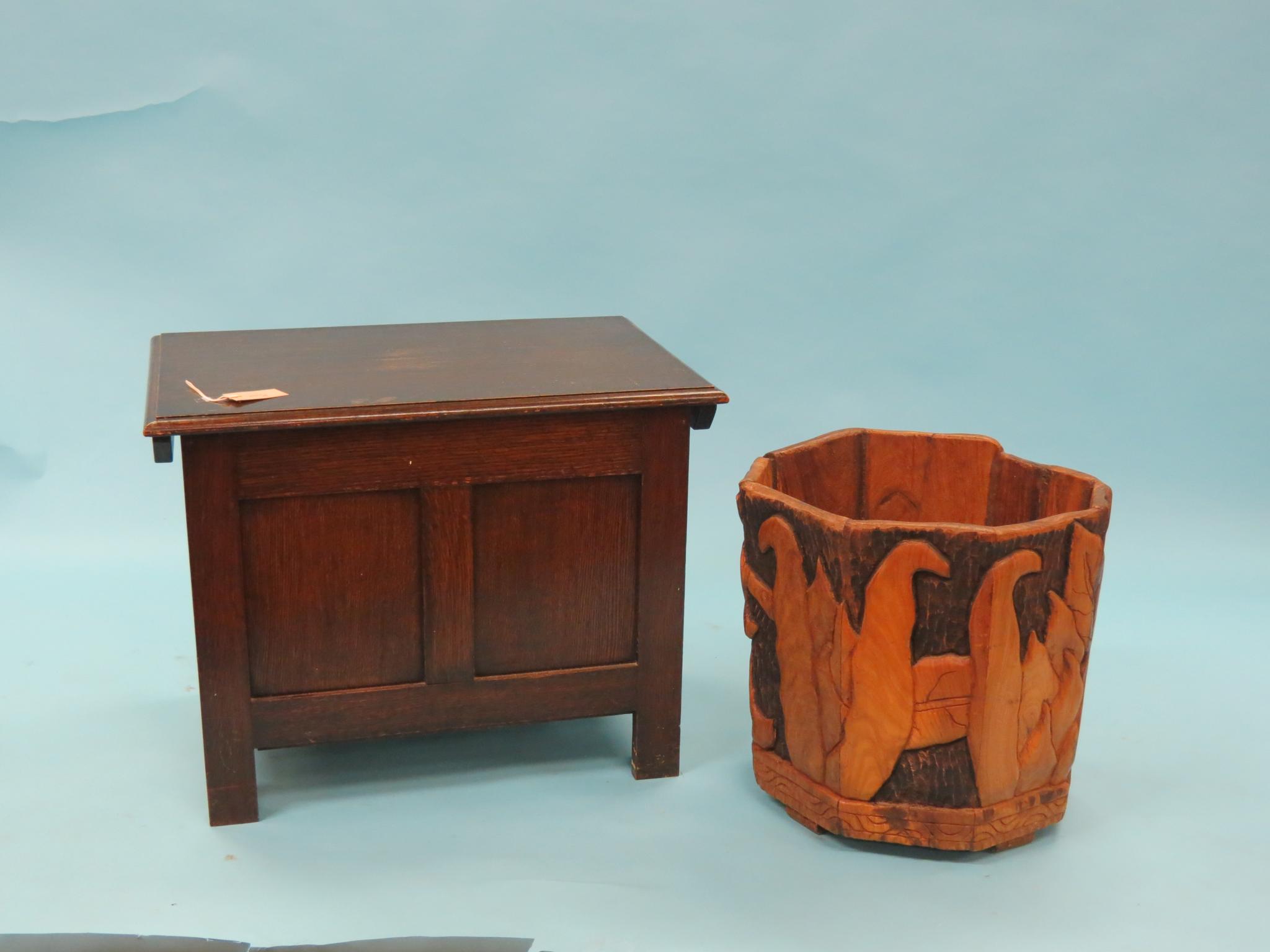 Appraisal: A small dark oak coffer panelled construction ft in together