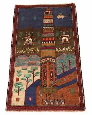 Appraisal: A Pictoral Carpet Depicting a monolithic structure in a tree-filled