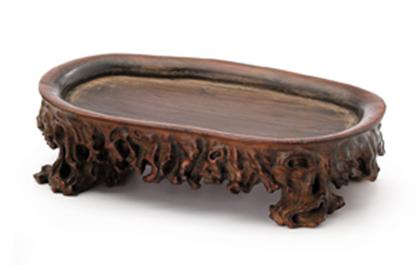 Appraisal: Fine Chinese hongmu stand th century Of recessed oval form