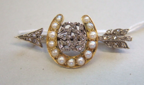 Appraisal: A rose cut diamond and half pearl set brooch designed