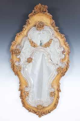 Appraisal: An Antique Venetian Giltwood Framed Mirror The traditionally formed Venetian