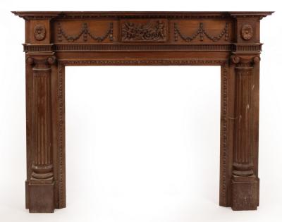 Appraisal: A Georgian style fire surround with central panel of carved