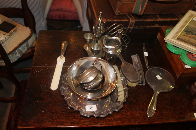 Appraisal: A SILVER CREAM JUG a silver backed dressing table set