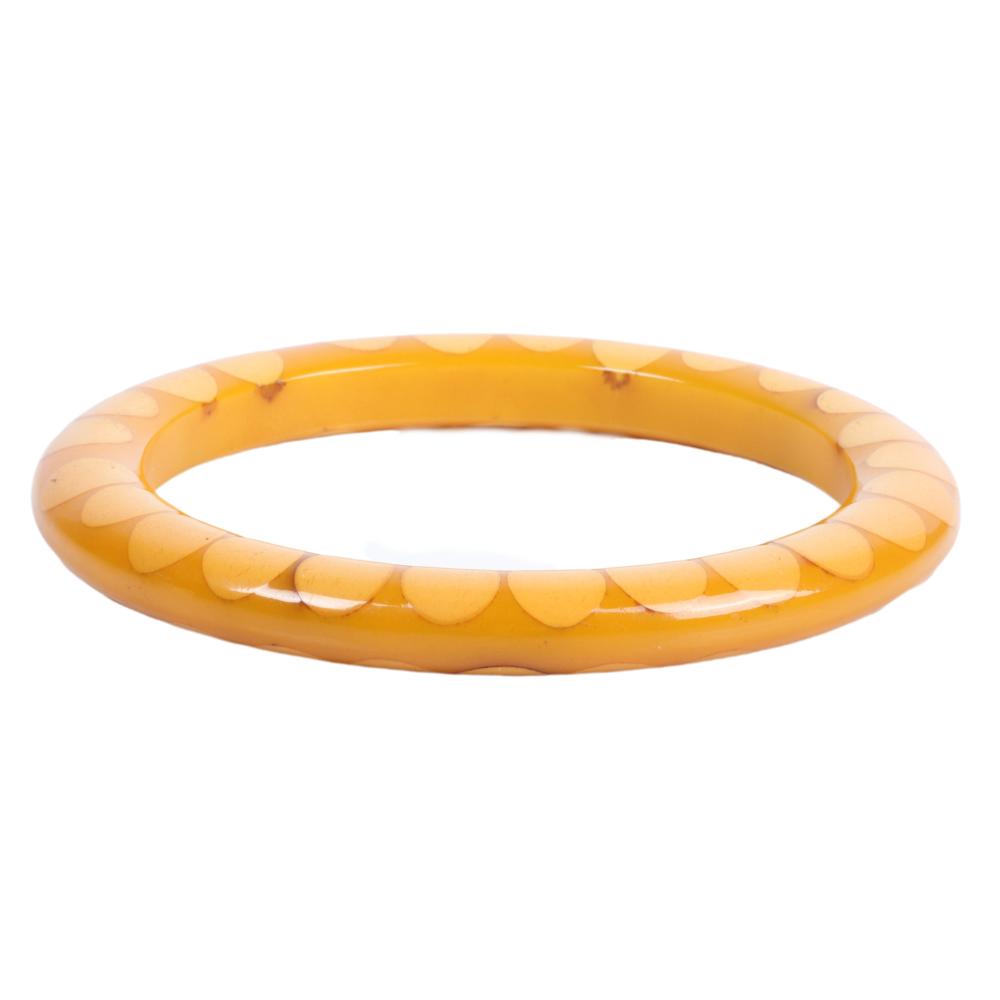 Appraisal: CREAM AND LEMON YELLOW BAKELITE RANDOM DOT BANGLE BRACELET W