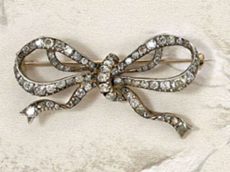 Appraisal: GEORGIAN DIAMOND BOW BROOCH Late Georgian silver topped k yellow