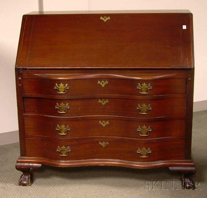 Appraisal: Chippendale-style Carved Mahogany Slant-lid Serpentine Desk possibly Paine Furniture wd